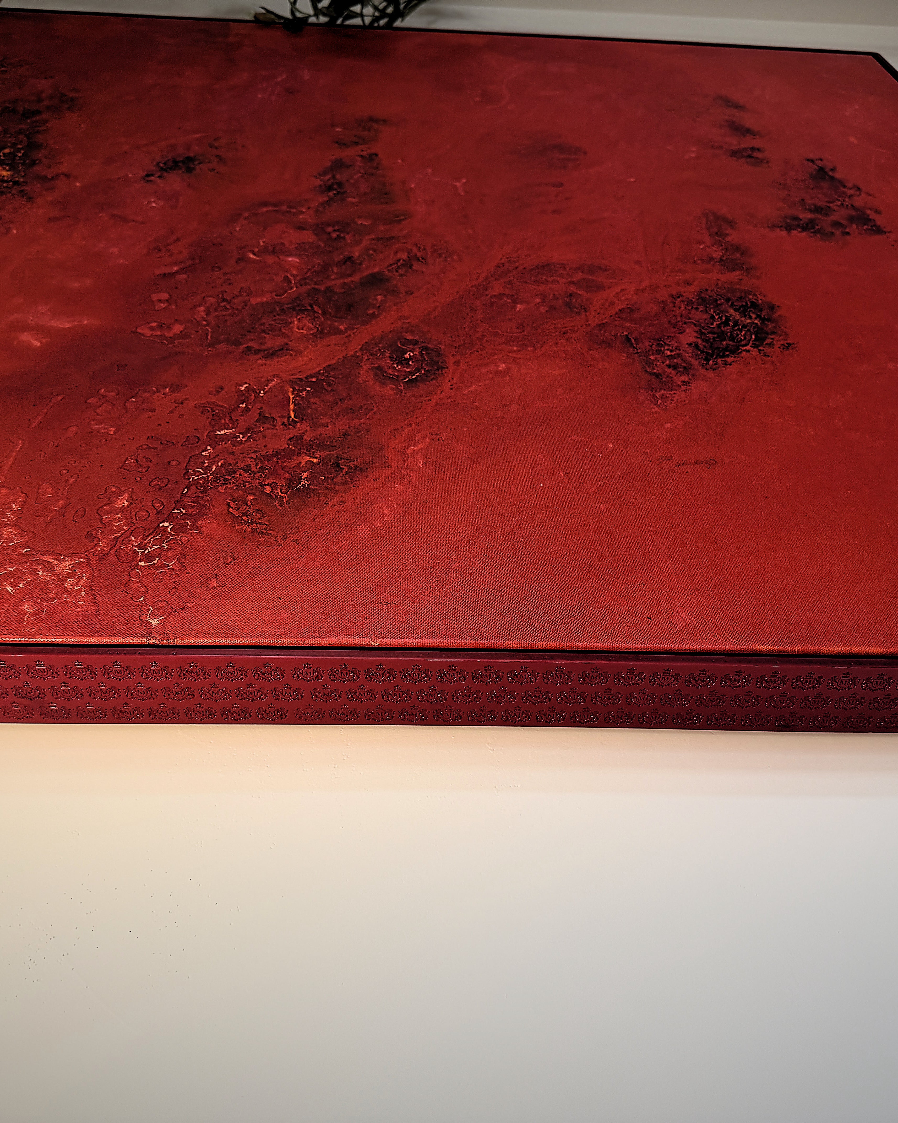 R3D — the painted surface meeting the embossed edge of the crest frame